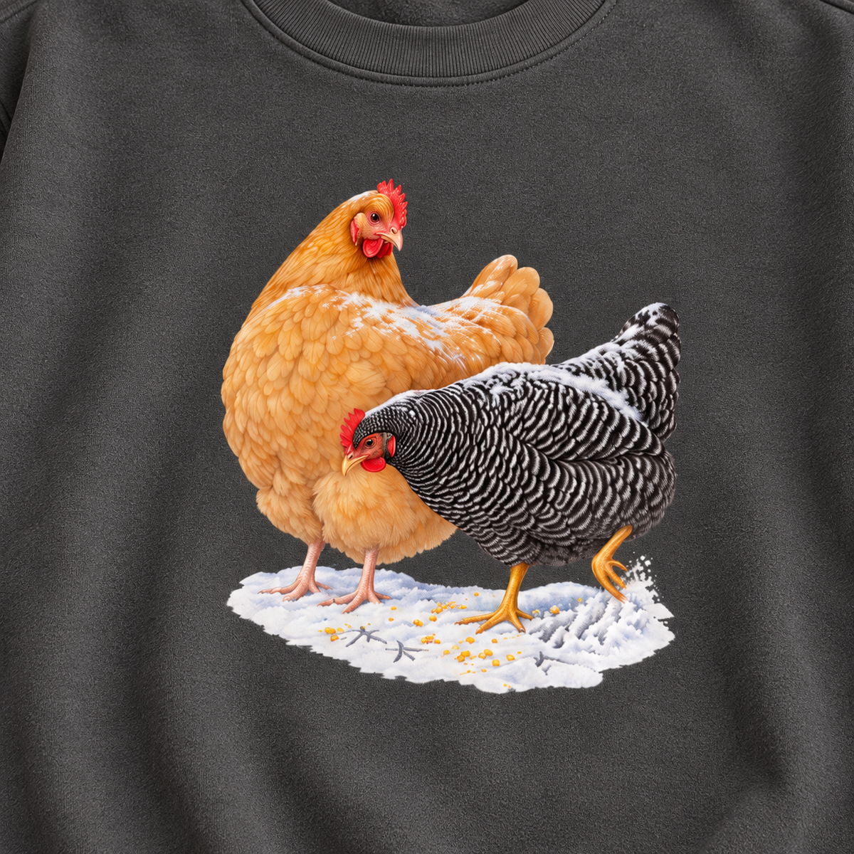 Winter hens sweatshirt in Pepper worn by a woman – the two hens in snow on a washed charcoal Comfort Colors 1566 crewneck