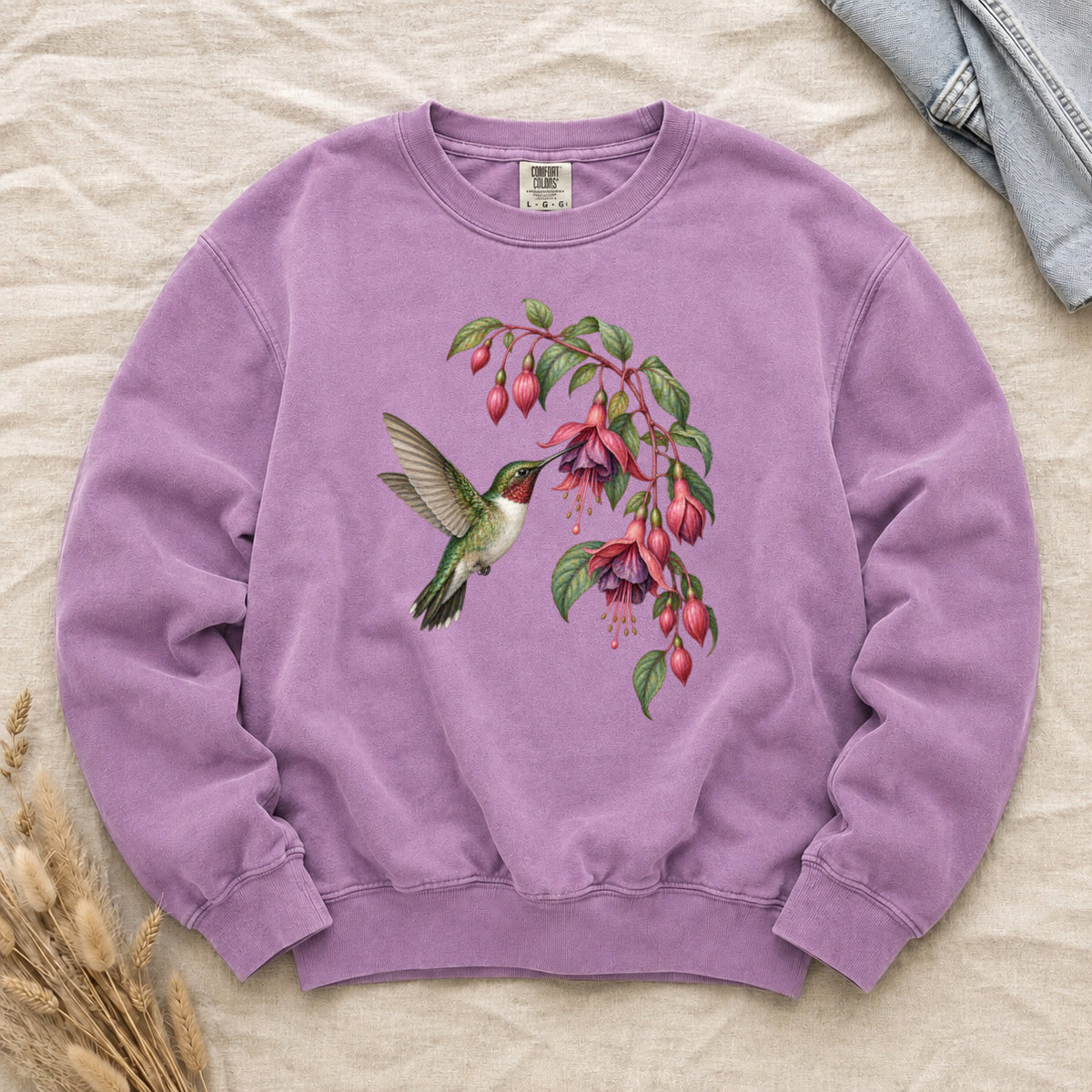 Stay a Little Longer sweatshirt in Orchid, a hummingbird and fuchsia flowers on soft lilac
