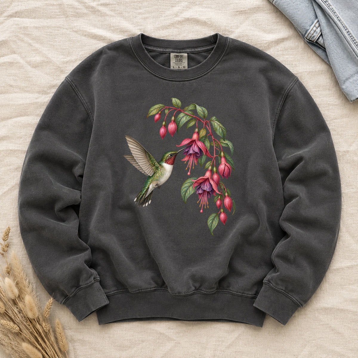 Stay a Little Longer sweatshirt in Pepper, a vintage hummingbird and fuchsia print on washed charcoal