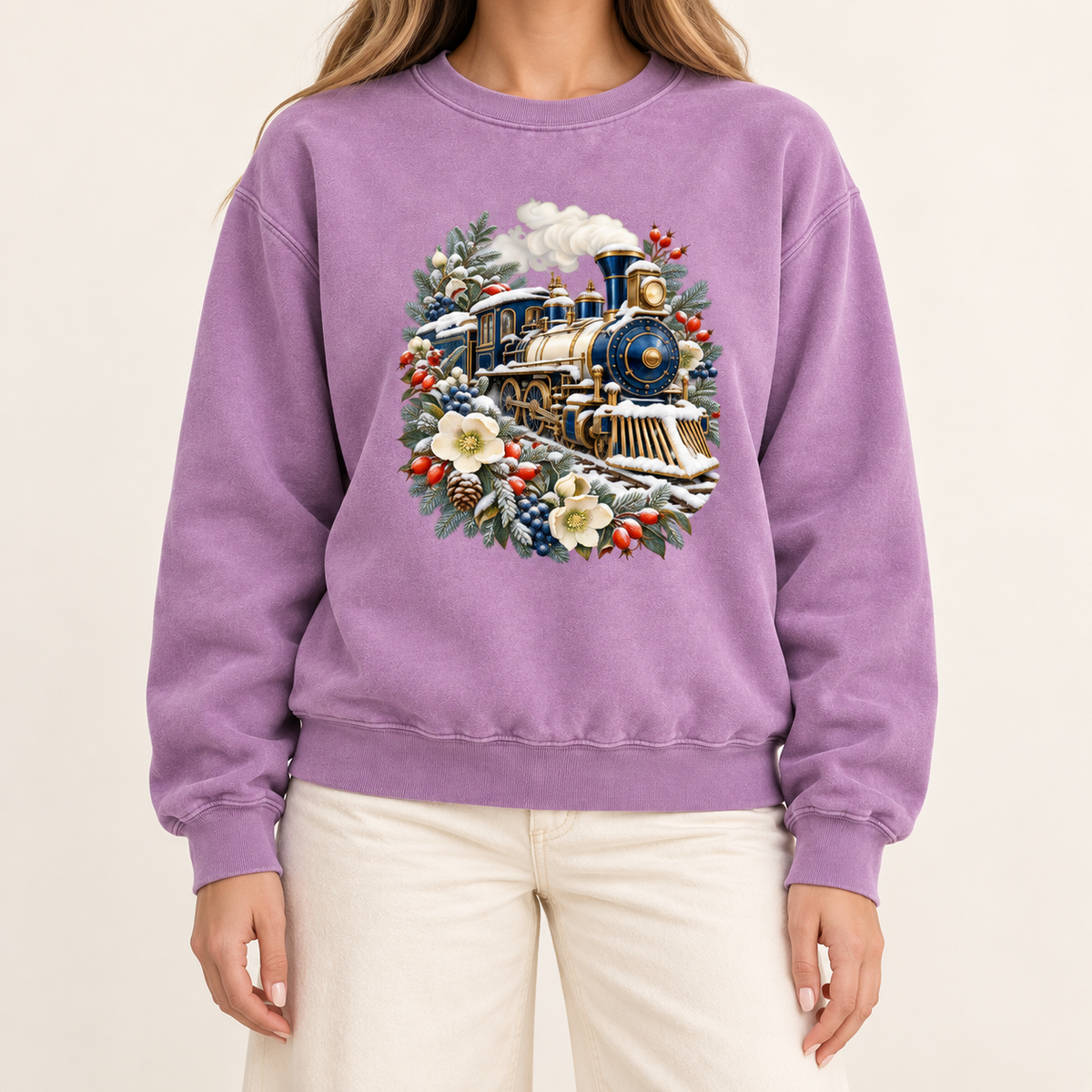 Vintage steam train and winter botanicals design on a heavyweight garment-dyed Comfort Colors 1566 crewneck — a deep blue and gold steam locomotive ringed by snow-dusted evergreen, red berries, pinecones and cream flowers
