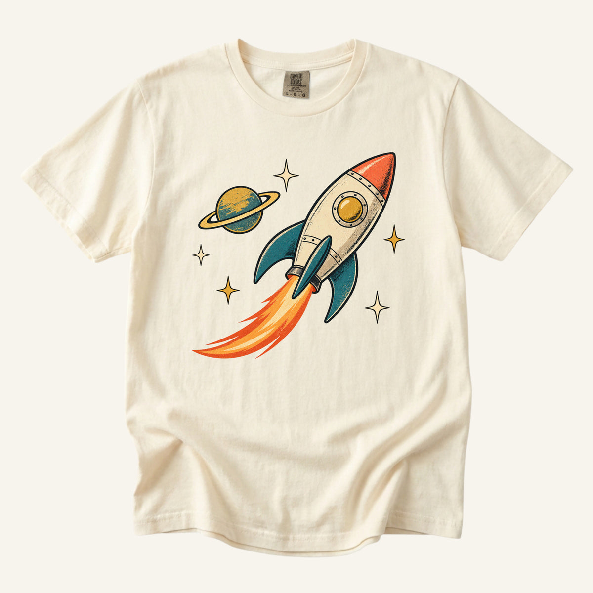 Still Looking Up T-Shirt in Ivory — a light backdrop for the rocket, planet and starbursts