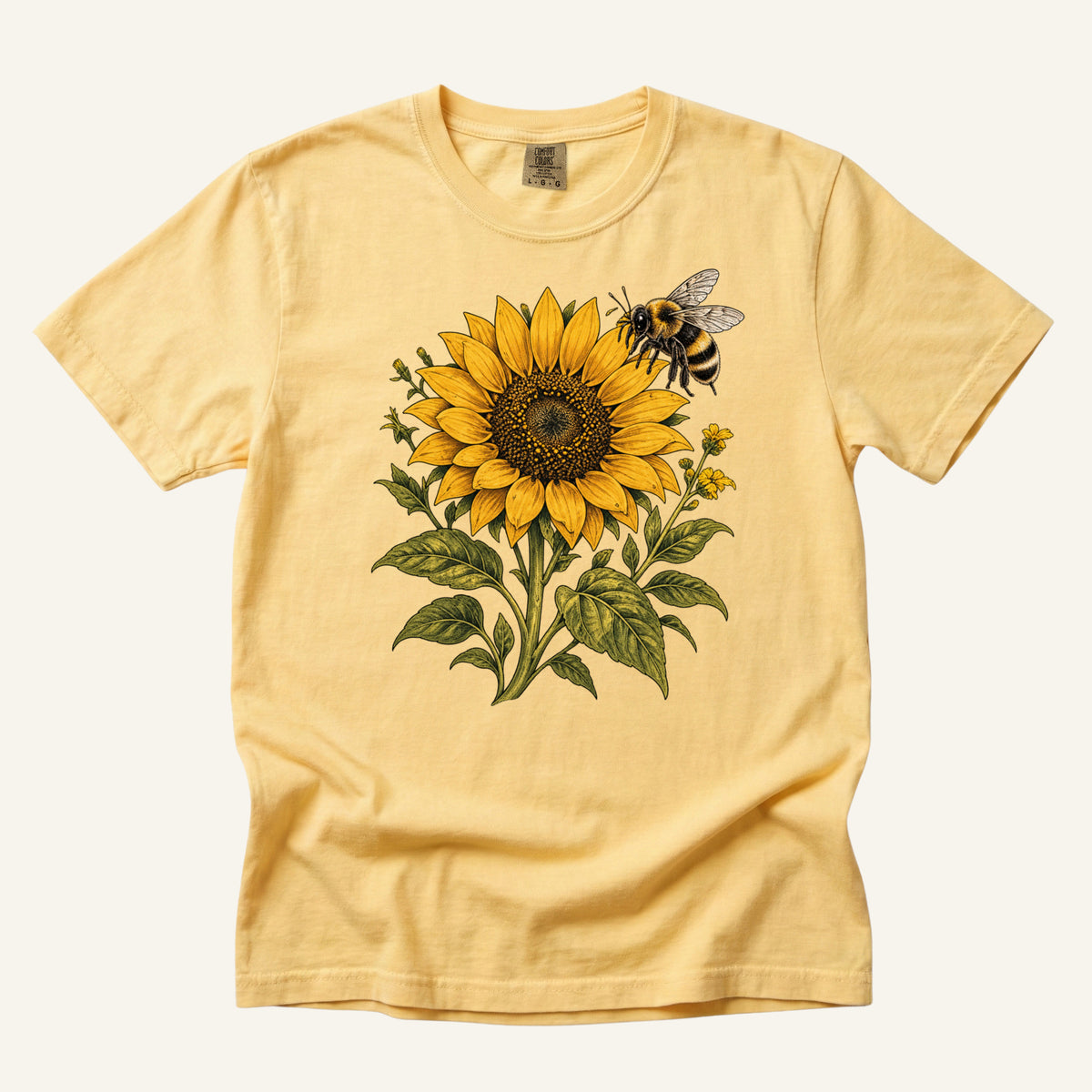 Summer Has Company tee in Butter, a sunflower and bumblebee print on soft yellow