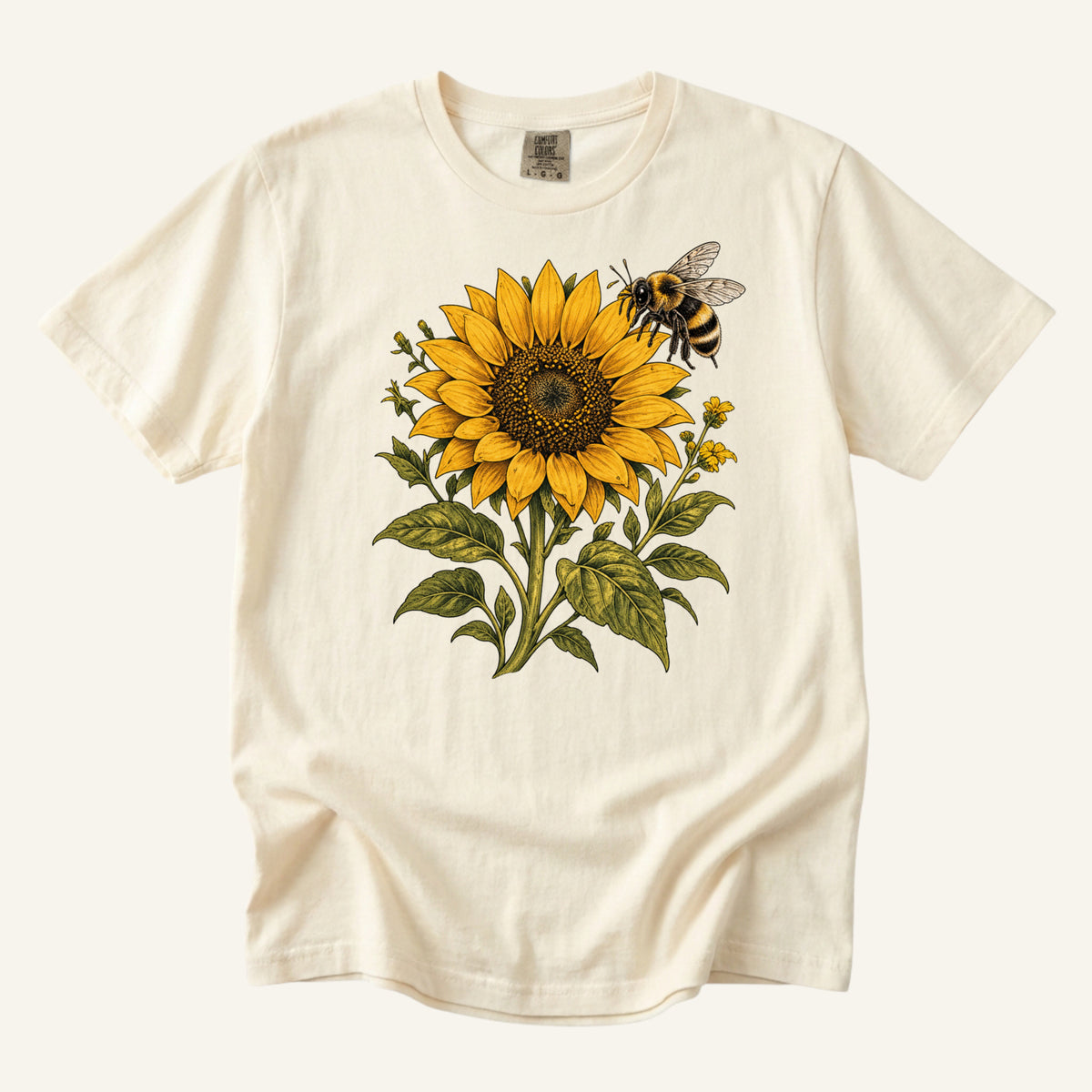 Summer Has Company tee in Ivory, a golden sunflower with a hovering bumblebee and olive-green leaves