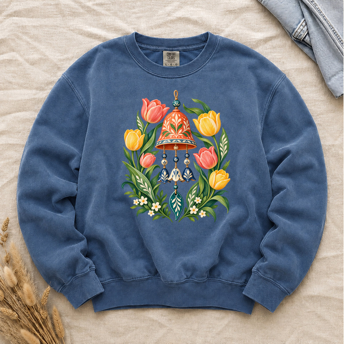 Garden Wind Chime & Tulip Sweatshirt in Blue Jean — a deeper setting that enriches the warm flowers and the coral bell