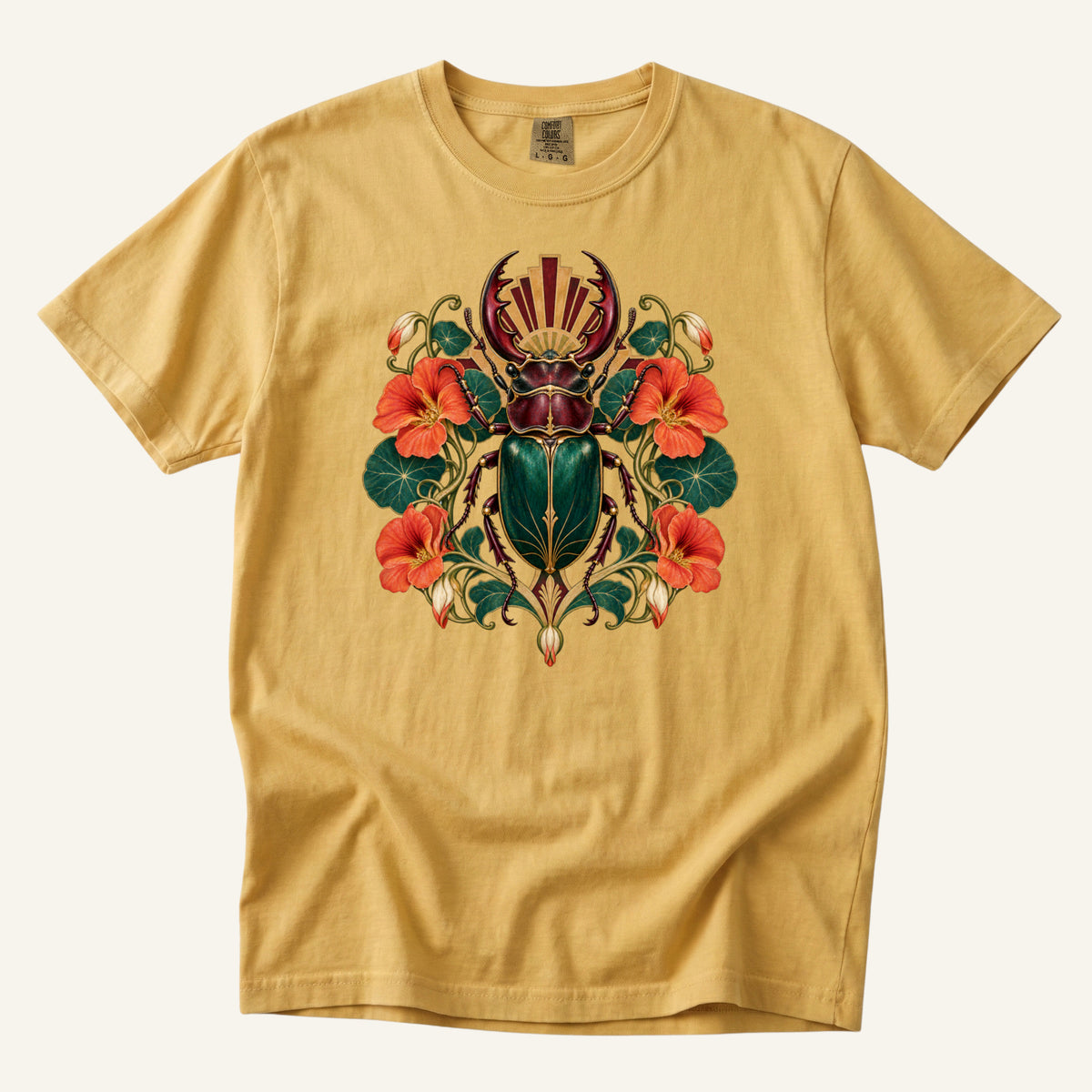 The Emerald Guardian T-Shirt in Mustard — warm gold ground for the emerald beetle and orange flowers