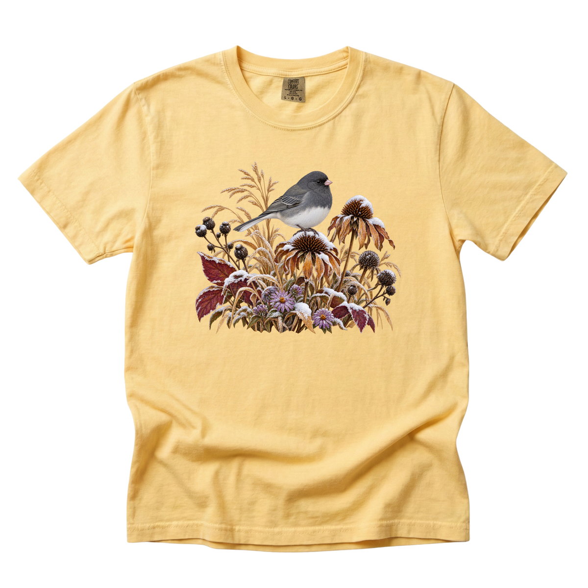 The Garden Is Still Open tee in Butter, a gray bird among autumn seed heads and purple flowers