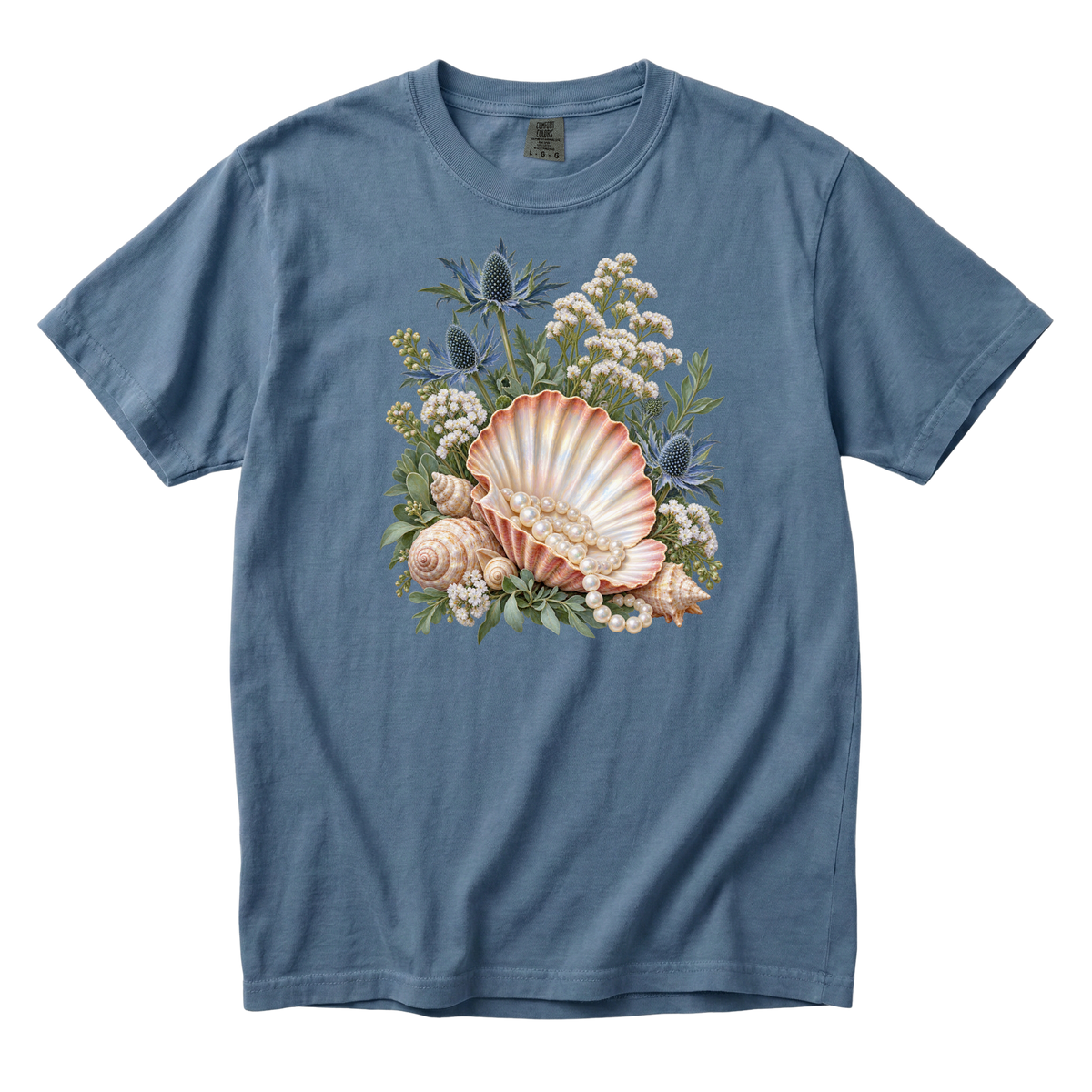 The Sea Came Home premium seashell and pearl tee in Blue Jean, a coastal botanical print