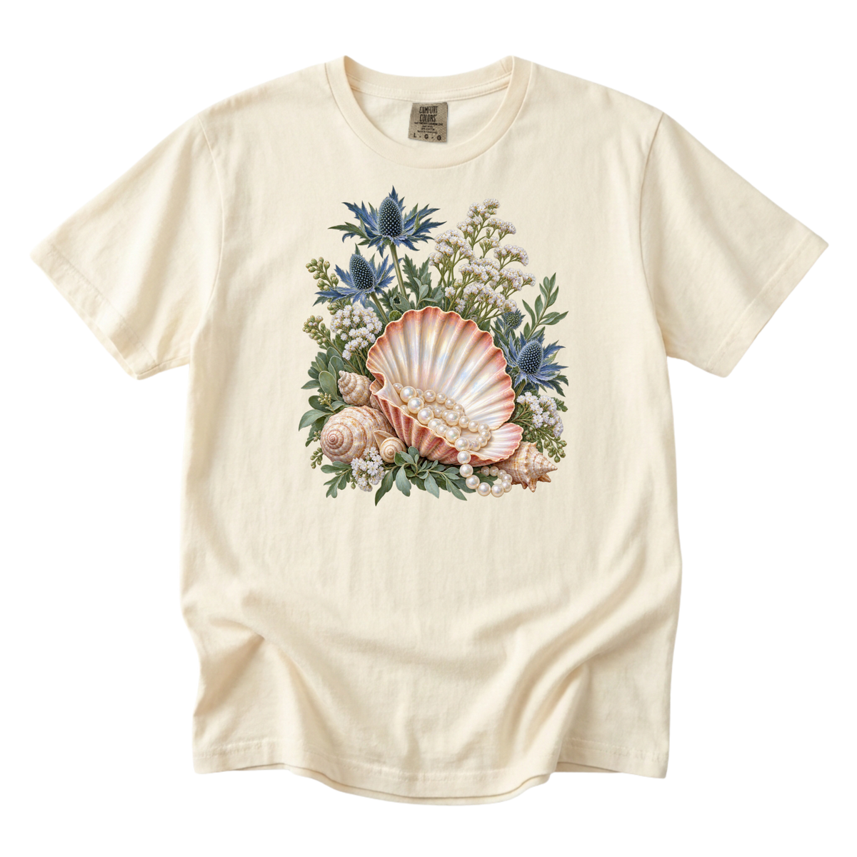 The Sea Came Home premium seashell tee in Ivory, a shell holding a strand of pearls