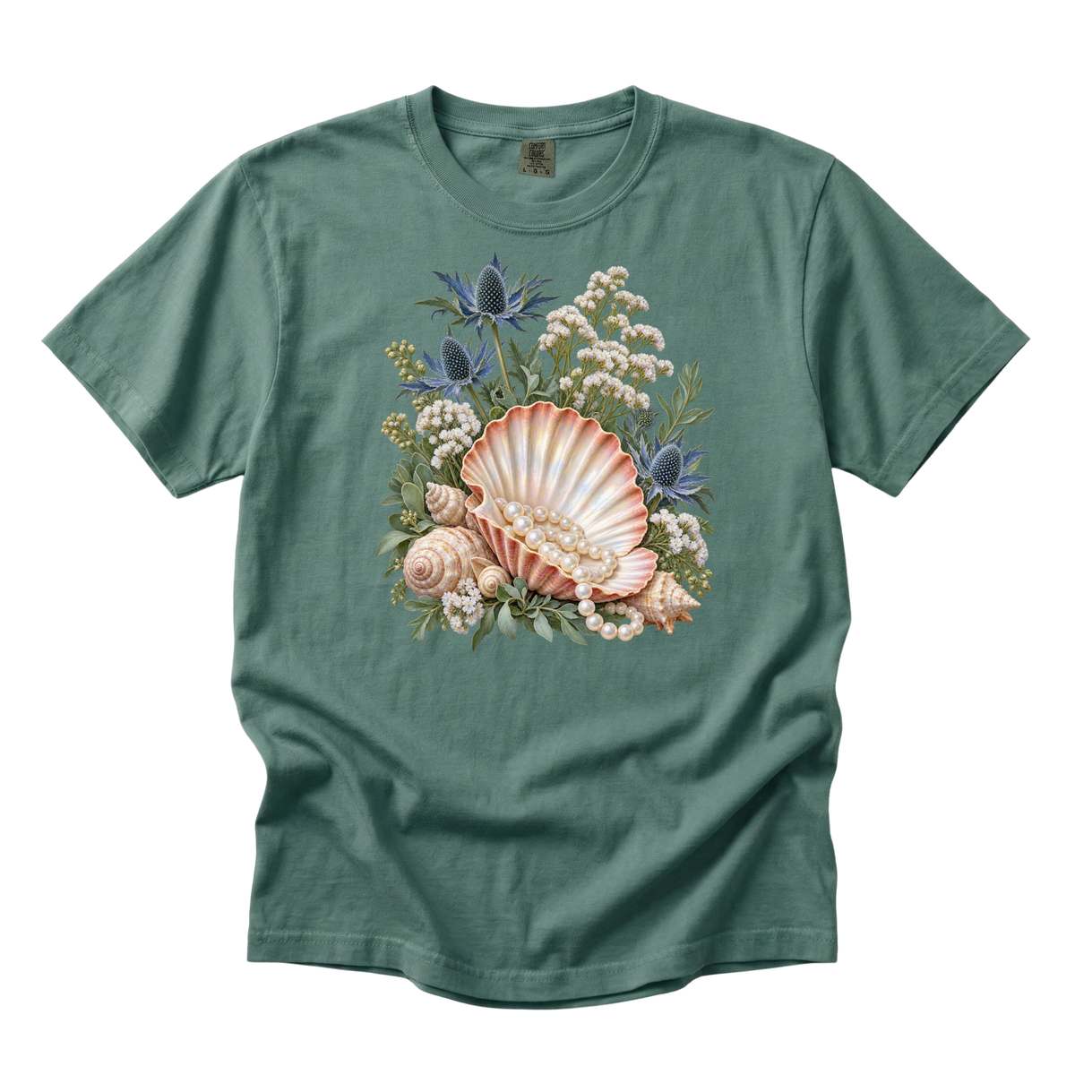 The Sea Came Home premium seashell tee in Light Green, a coastal shell and flower print