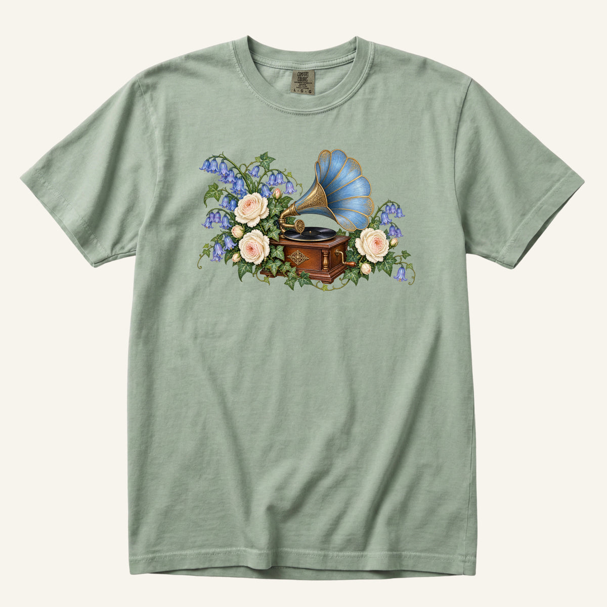 The Song Stayed tee in Bay, a vintage gramophone with a blue gold-trimmed horn among cream roses and blue flowers