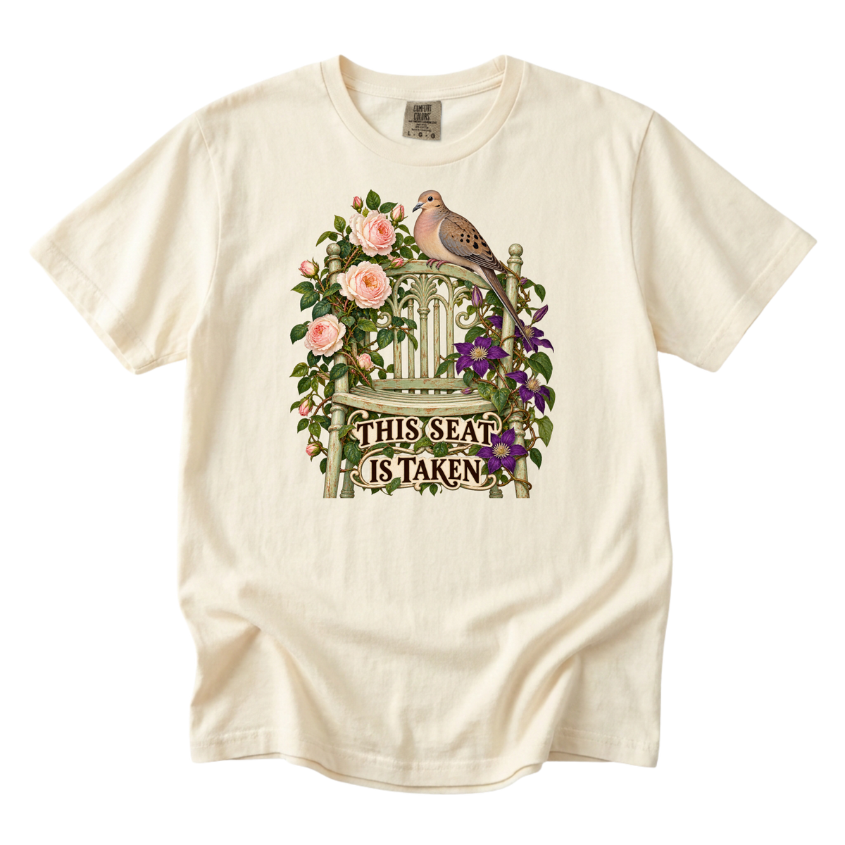 This Seat Is Taken tee in Ivory, a dove perched on an ornate garden chair among peach roses