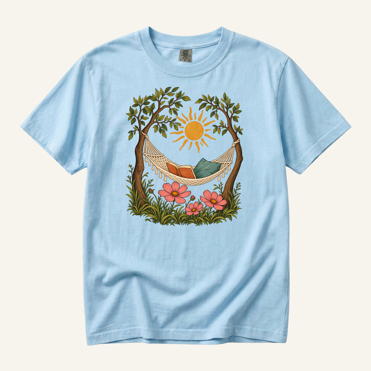 This Counts as Plans T-Shirt in Chambray — a soft blue that gives the garden scene an open-sky feel