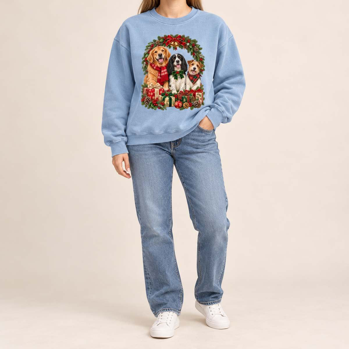 The three-dog Christmas wreath print shown large and centered on the chest of a garment-dyed Comfort Colors crewneck sweatshirt, not a back print