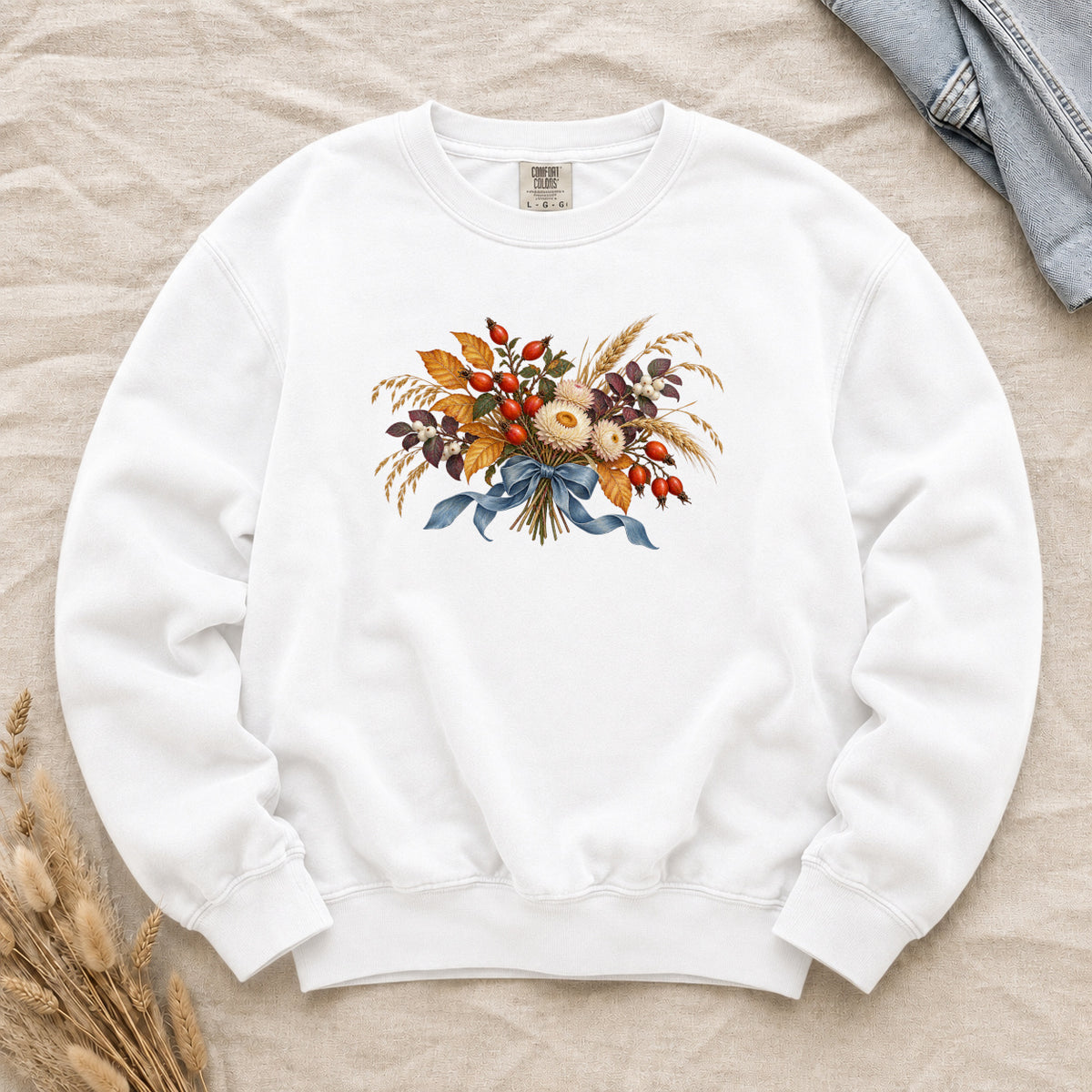 Tied to September sweatshirt in White, a vintage autumn bouquet print with a flowing blue ribbon