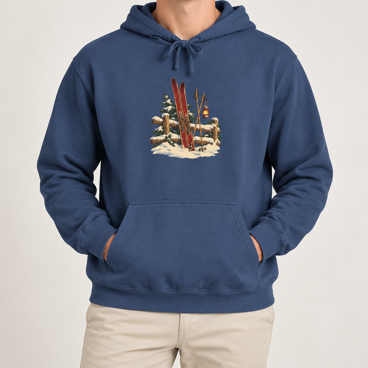 Vintage Ski Lodge hoodie in True Navy worn, front view with the small skis-and-fence print