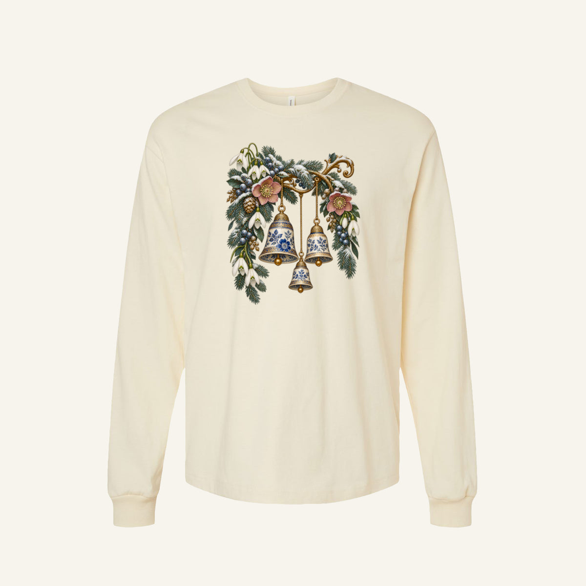Vintage Winter Bells Long Sleeve Tee in Natural — blue-and-white porcelain bells hanging among winter botanicals and evergreen greenery