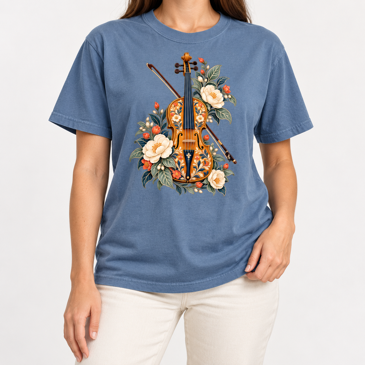 Violin and bow folk-art t-shirt shown worn, closer view of the amber violin and cream blossoms