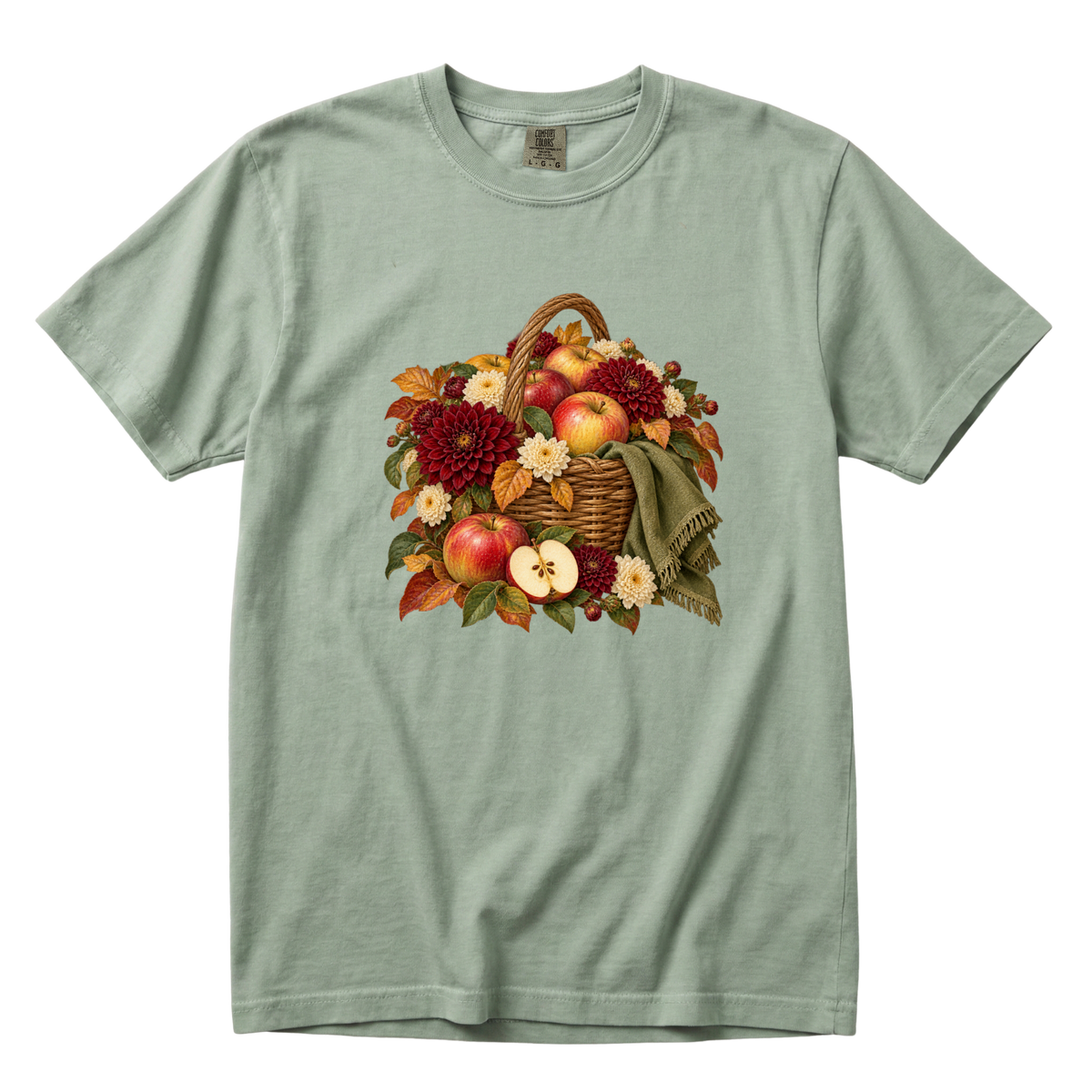 We Picked Too Many tee in Bay, an apple picking basket print on soft sage green