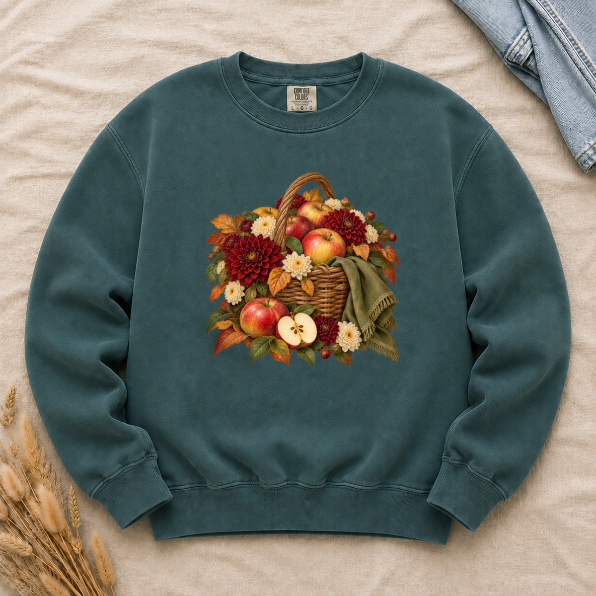 We Picked Too Many apple harvest sweatshirt in Blue Spruce, a basket of apples with autumn flowers