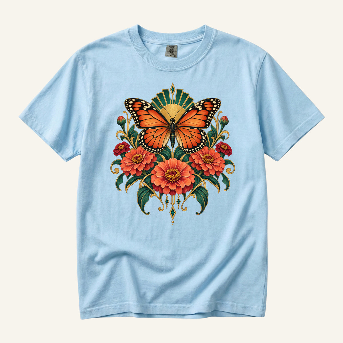 Where Summer Lands T-Shirt in Chambray — soft blue with the orange butterfly and deep green foliage