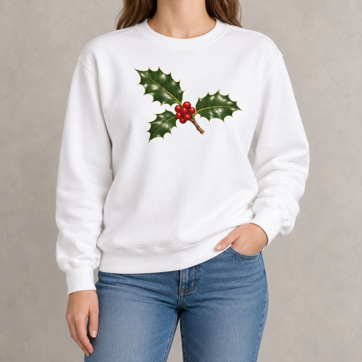 Holly sweatshirt in White worn, glossy holly sprig with red berries across the chest