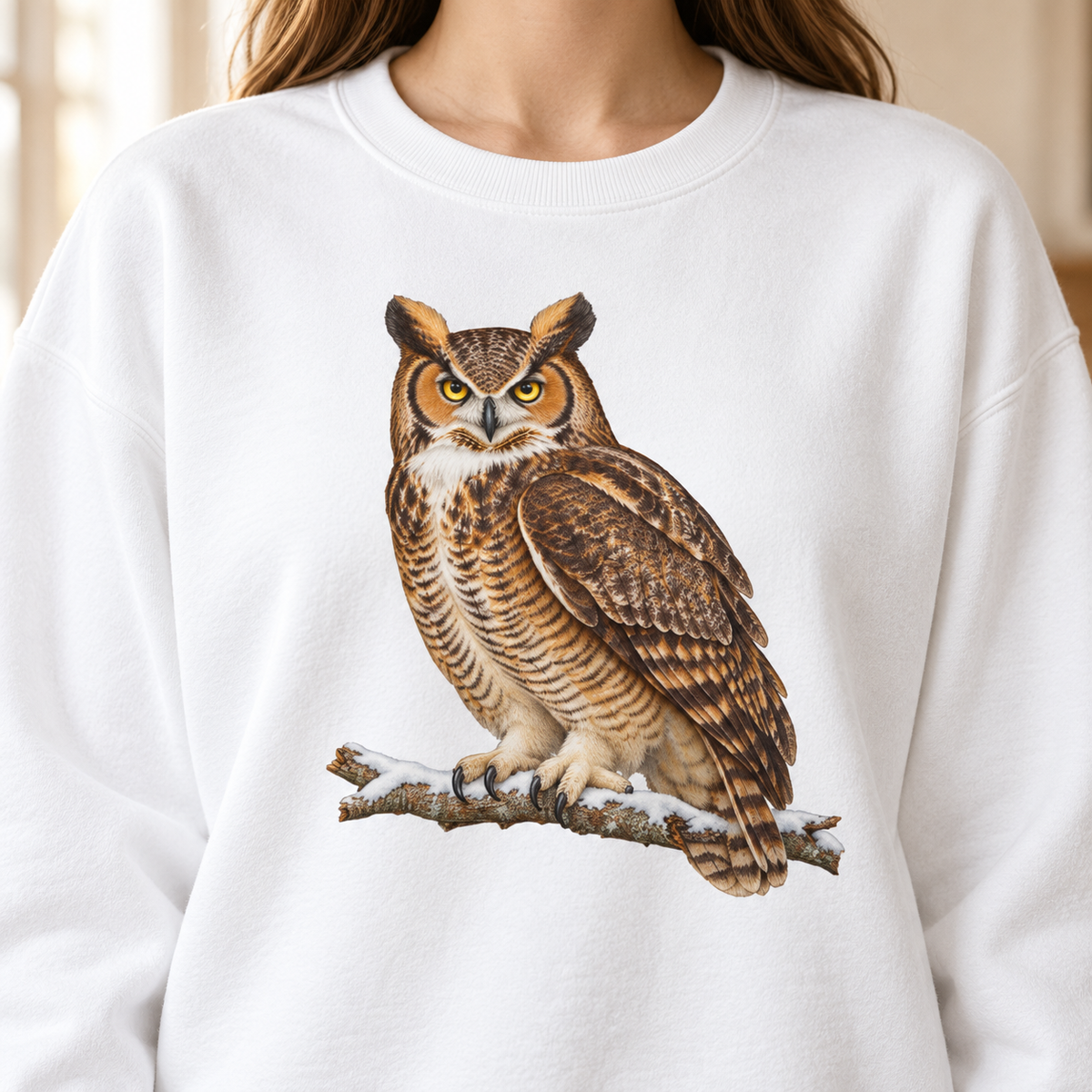 Great horned owl sweatshirt in White – the golden-eyed owl on a snowy branch, every feather edge outlined on a garment-dyed Comfort Colors crewneck