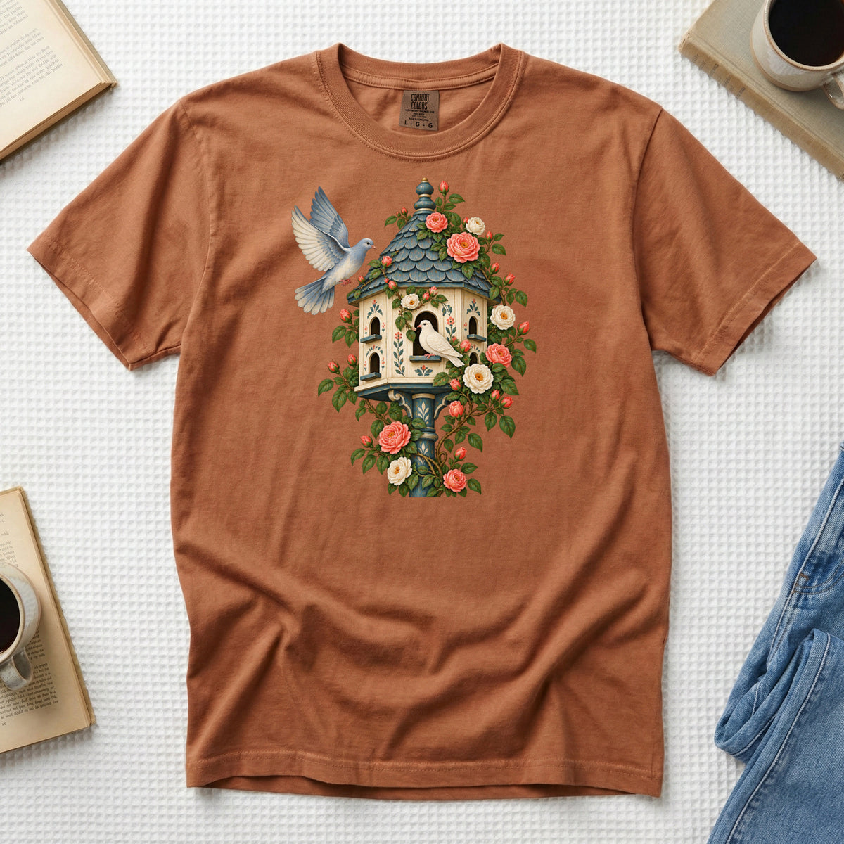 Whoever Gets There First T-Shirt in Yam — an earthy orange echoing the coral roses