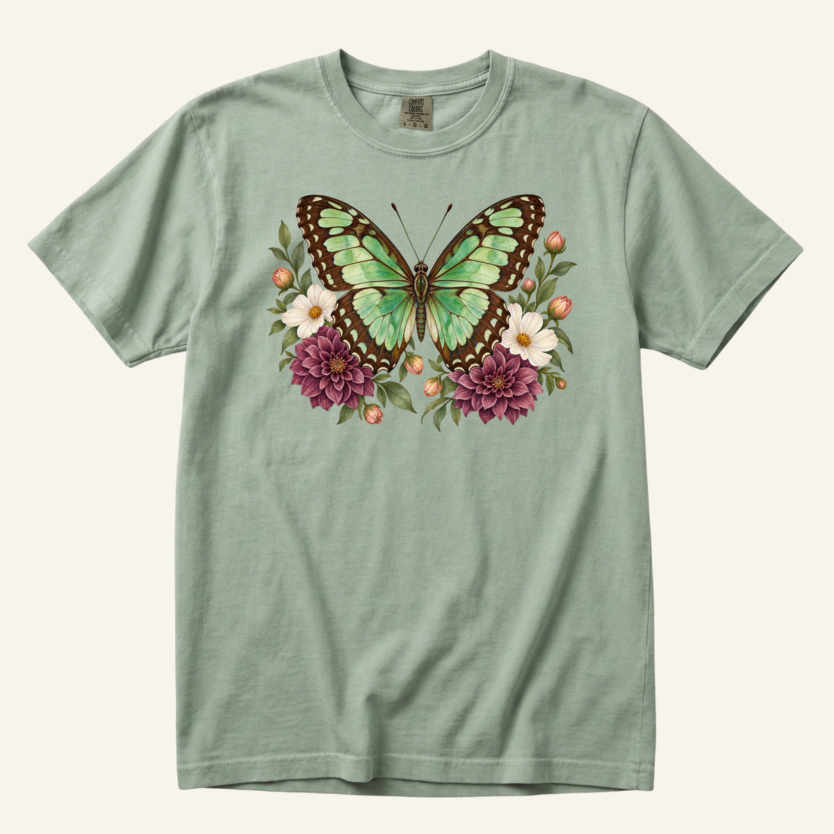 Butterfly Graphic Tee in Bay — green butterfly and botanical watercolor artwork, centered front print