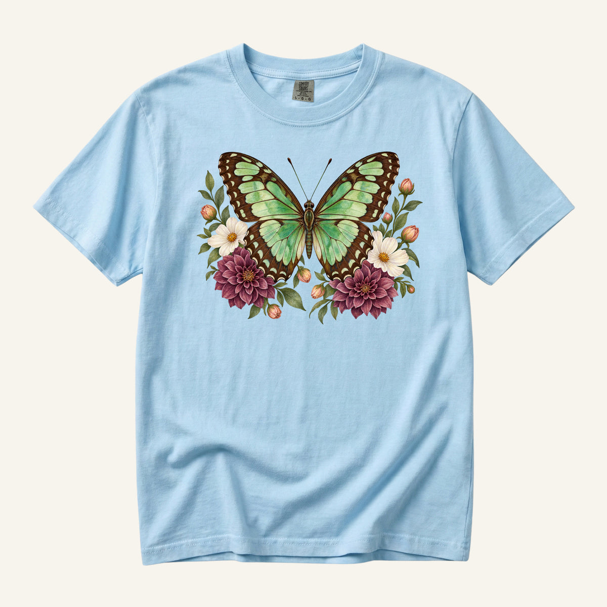 Butterfly Graphic Tee in Chambray — a mint-green butterfly above plum dahlias and cream flowers on garment-dyed cotton