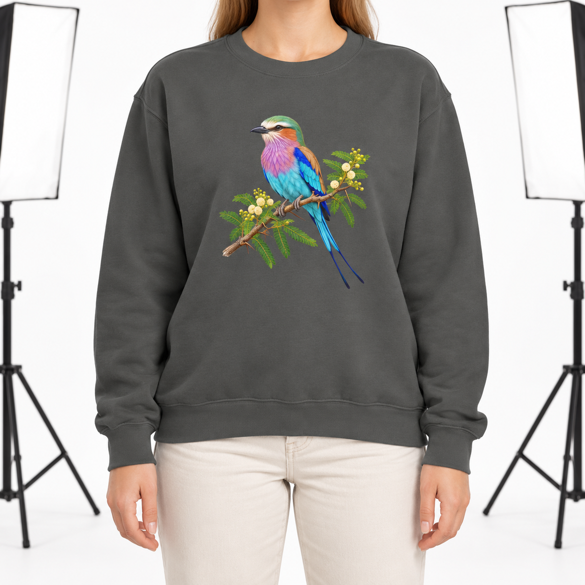 Woman wearing the Lilac-Breasted Roller on Acacia sweatshirt in Pepper