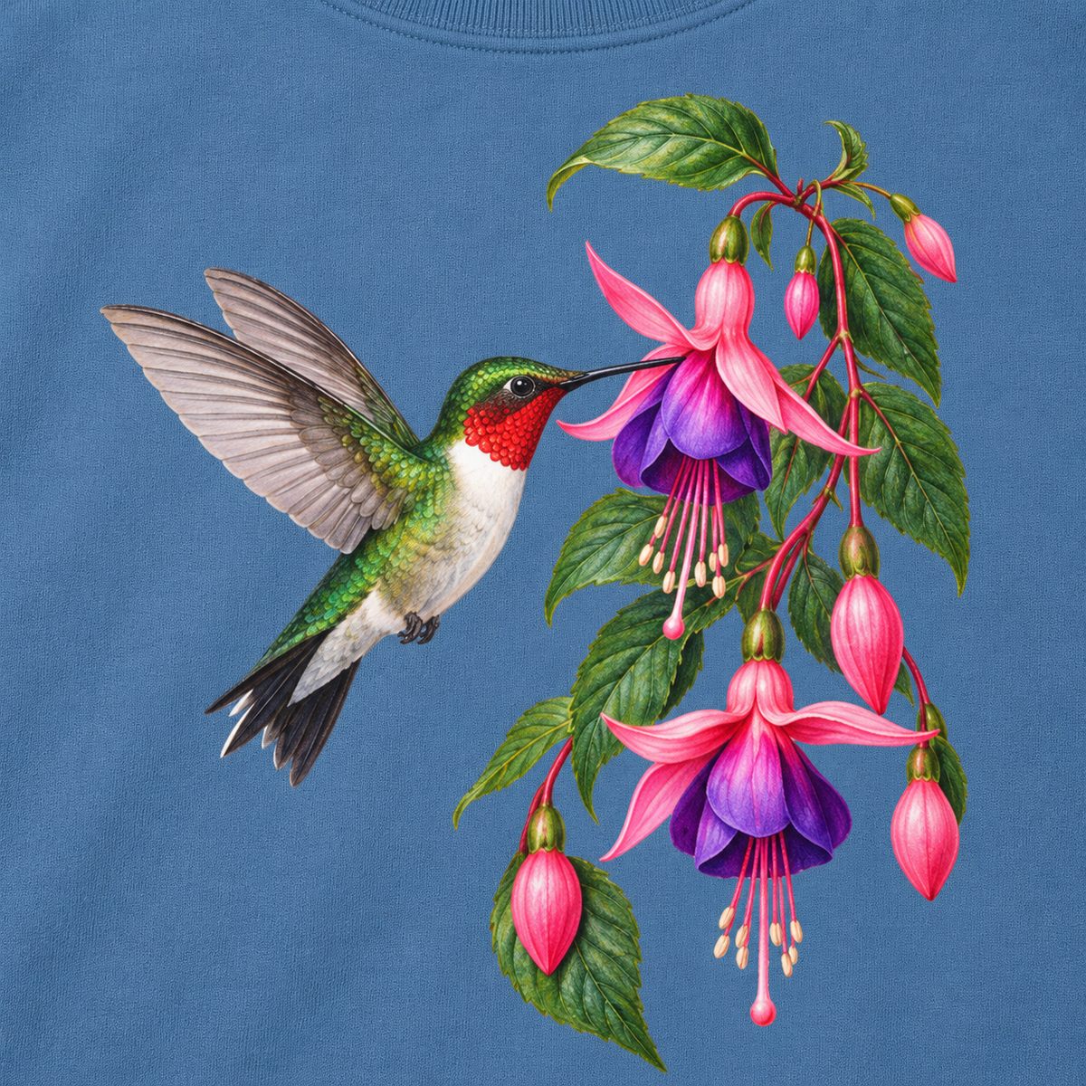 Close-up of the ruby-throated hummingbird and fuchsia print on Blue Jean fleece, showing the red gorget, green back and dangling fuchsia blooms