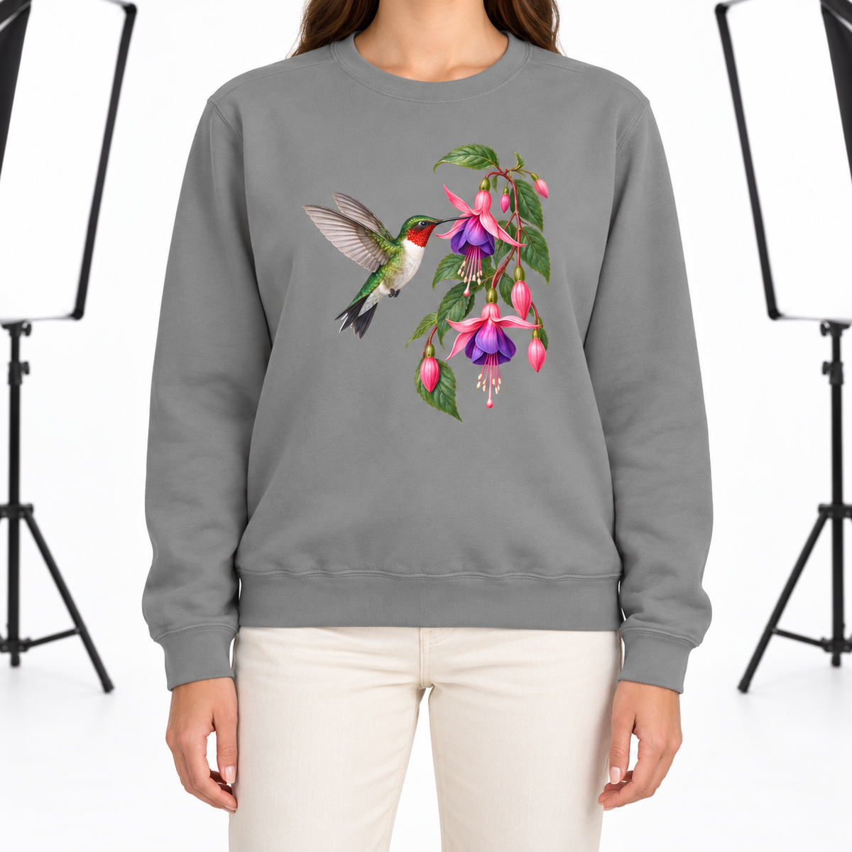 Woman wearing the Ruby-throated Hummingbird & Fuchsia sweatshirt in Grey