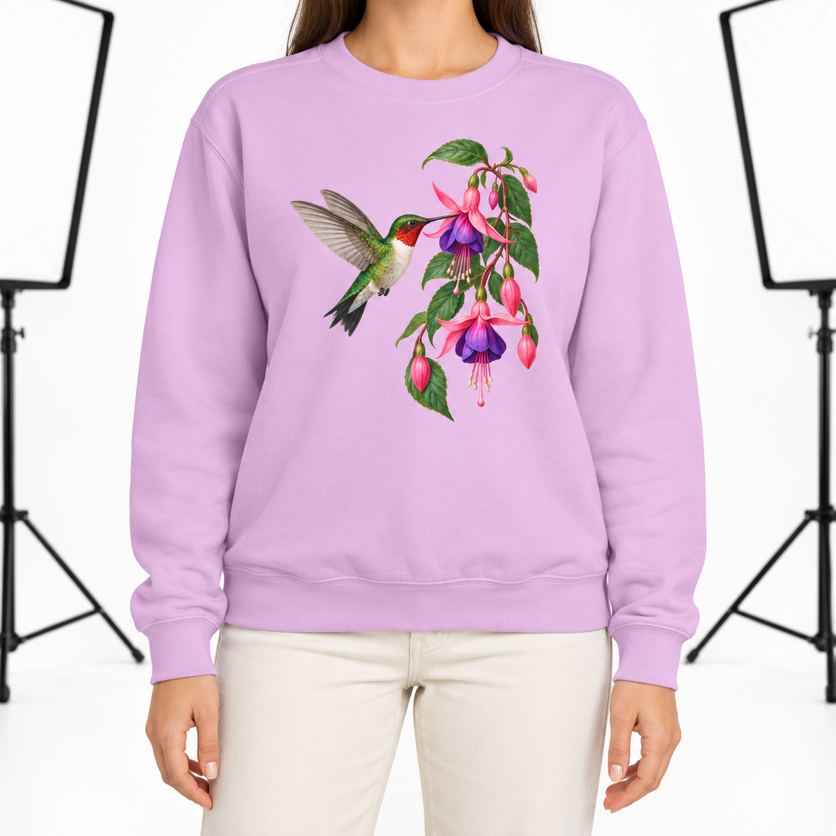 Woman wearing the Ruby-throated Hummingbird & Fuchsia sweatshirt in Orchid