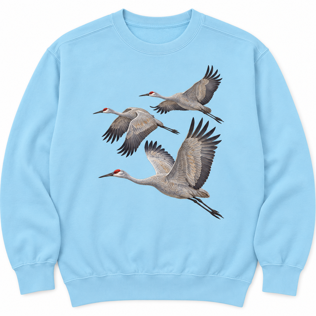 Front view of a Chambray Comfort Colors 1566 crewneck sweatshirt with three sandhill cranes in flight printed on the chest, no text, laid flat