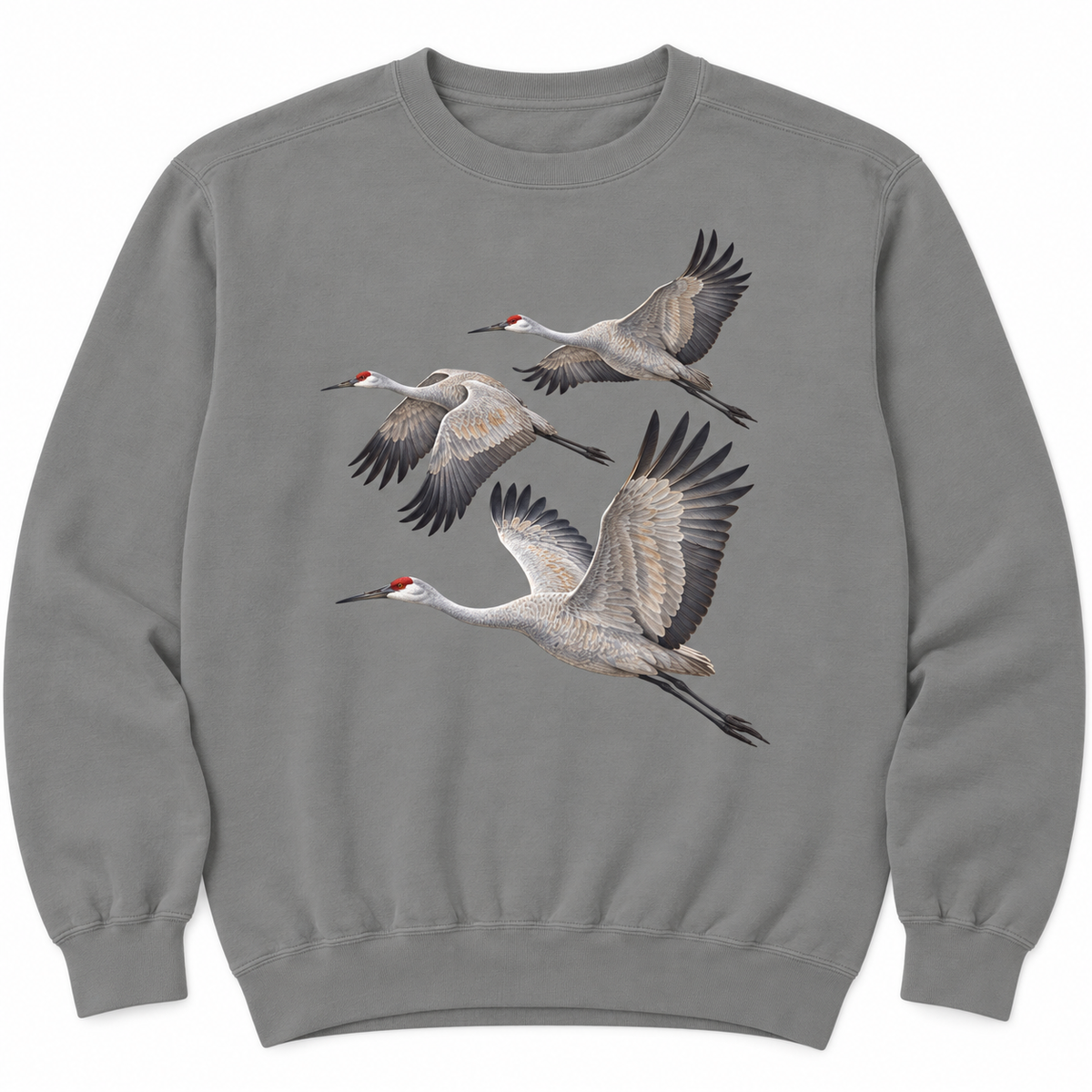Front view of a Grey Comfort Colors 1566 crewneck sweatshirt with three sandhill cranes in flight printed on the chest, no text, laid flat