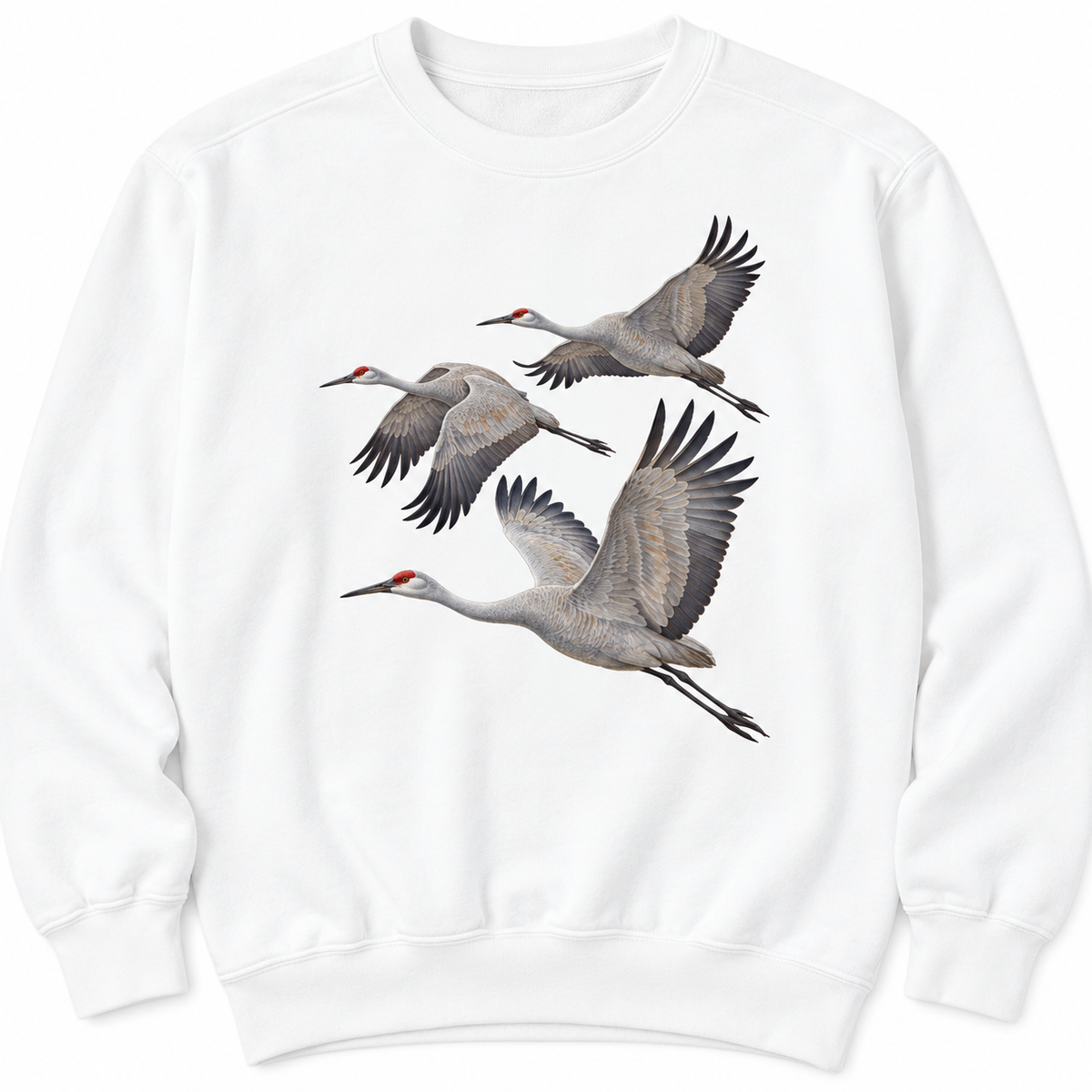Front view of a White Comfort Colors 1566 crewneck sweatshirt with three sandhill cranes in flight printed on the chest, no text, laid flat