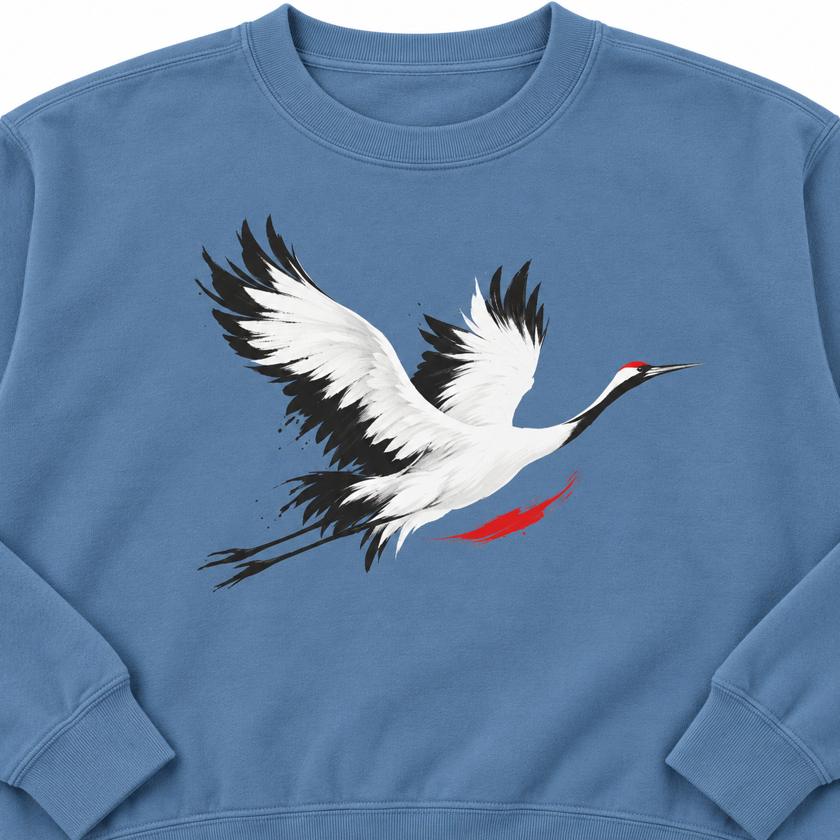 Blue Jean Comfort Colors 1566 crewneck sweatshirt with a minimalist red-crowned crane in flight printed on the chest, no text, laid flat