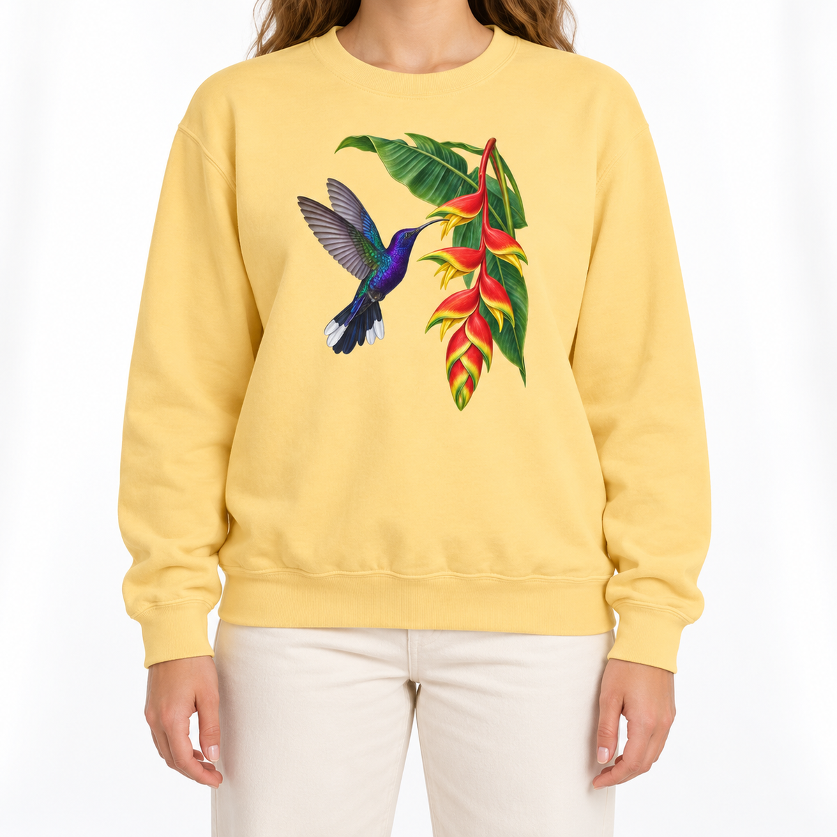 Violet Sabrewing Hummingbird & Heliconia sweatshirt in Butter, flat view of the garment-dyed Comfort Colors 1566 crewneck