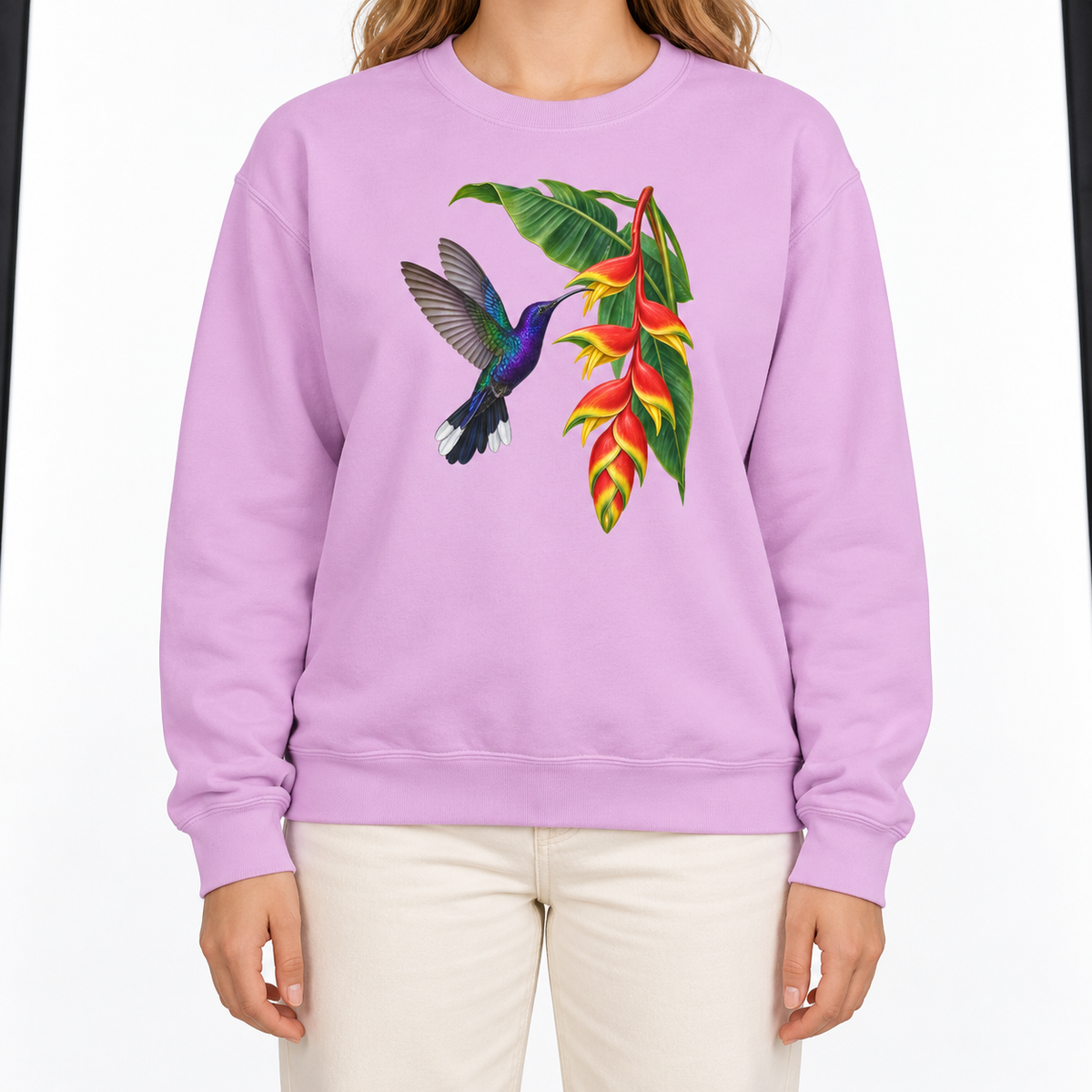 Woman wearing the Violet Sabrewing Hummingbird & Heliconia sweatshirt in Orchid